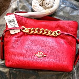 Red leather cross boy.